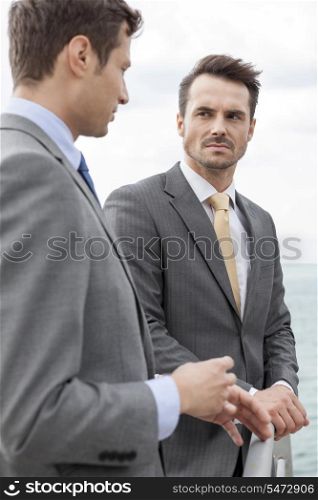 Businessmen having a discussion on terrace