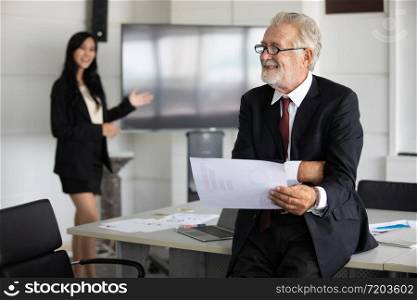 businessmen holding documents for business partners discussing and share ideas at meeting and business women smiling happy for working