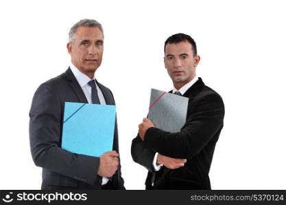 Businessmen holding folders