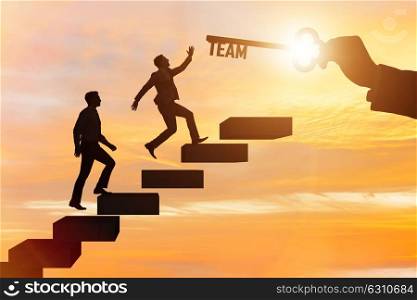 Businessmen on career ladder in teamwork concept