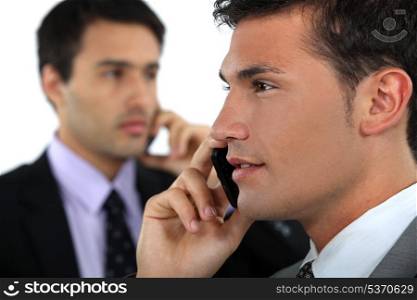 Businessmen on the phone