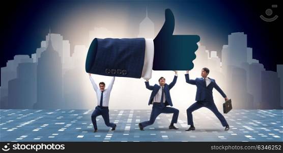 Businessmen supporting thumbs up gesture