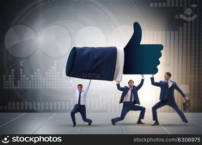 Businessmen supporting thumbs up gesture. The businessmen supporting thumbs up gesture