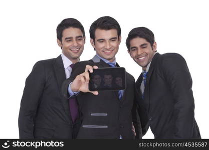 Businessmen taking a self portrait