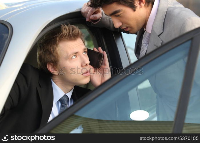 Businessmen talking before a meeting