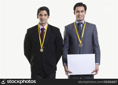 Businessmen with medals