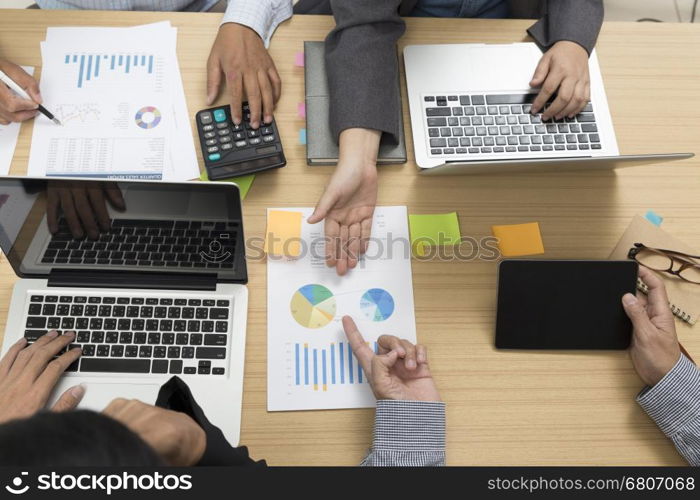 businessmen working with calculator, document, digital tablet, laptop computer for use as workplace concept