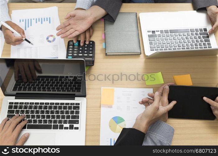 businessmen working with calculator, document, digital tablet, laptop computer for use as workplace concept