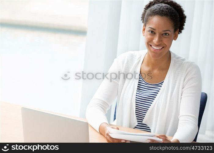 Businessowman working with papers in office