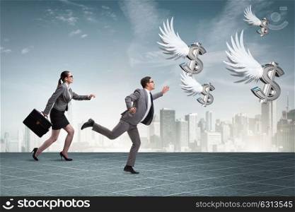Businesspeople chasing angel investor funding