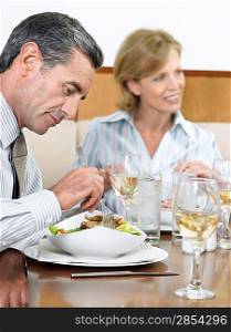 Businesspeople Eating at Restaurant