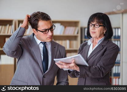 Businesspeople having business discussion in office