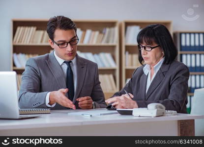 Businesspeople having business discussion in office