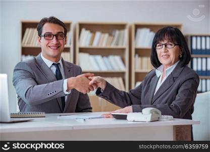 Businesspeople having business discussion in office