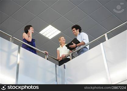 Businesspeople in Meeting on Balcony