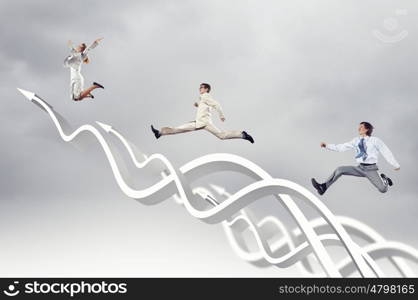 Businesspeople jumping. Young businesspeople jumping on white arrows. Growth concept