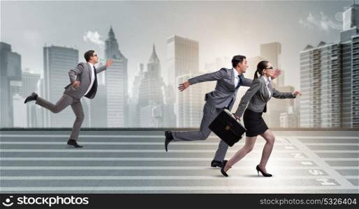 Businesspeople running in competition concept