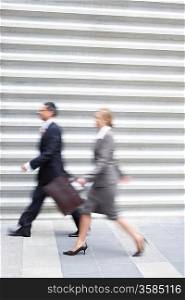 Businesspeople Walking Fast