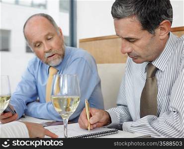 Businesspeople Working at Restaurant