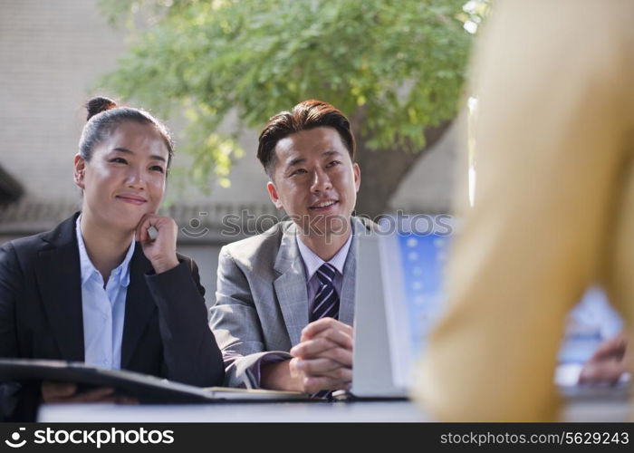 Businesspeople Working Outdoors