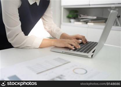 Businesswoman Accountant analyzing investment charts Invoice and pressing calculator buttons over documents. Accounting Bookkeeper Clerk Bank Advisor And Auditor Concept.