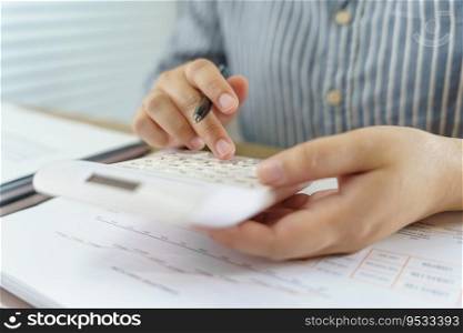 Businesswoman Accountant analyzing investment charts Invoice and pressing calculator buttons over documents. Accounting Bookkeeper Clerk Bank Advisor And Auditor