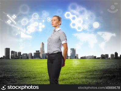 Businesswoman agaisnt virtual background. Business person standing against modern virtual technology background