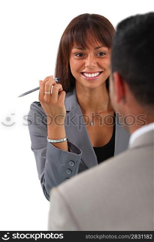 businesswoman and businessman having a discussion