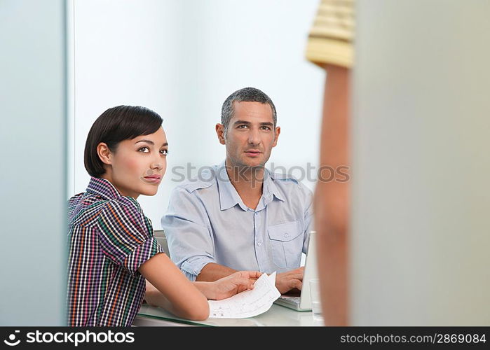 Businesswoman and Businessman in Meeting