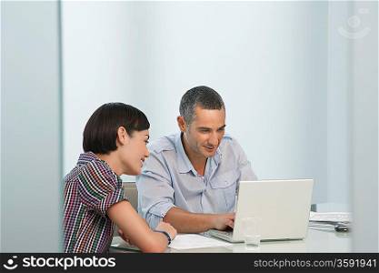 Businesswoman and Businessman in Meeting