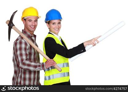 businesswoman and craftsman going to the construction site