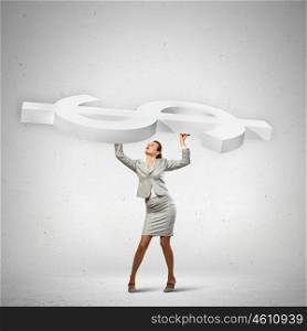 Businesswoman and dollar sign. Image of businesswoman holding macro sign of dollar