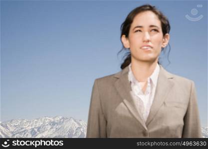 Businesswoman and mountain