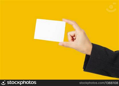 businesswoman asian holding and shown a business card on yellow background
