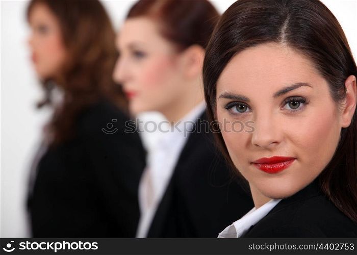 Businesswoman at a meeting with her colleagues