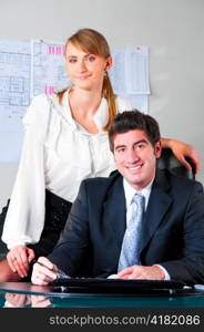 businesswoman at office with her boss in chair