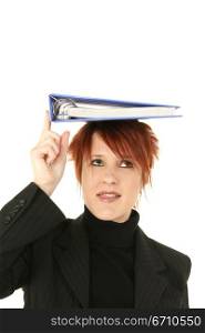 Businesswoman balancing a notebook on her head