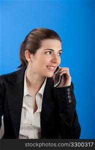 Businesswoman calling at phone