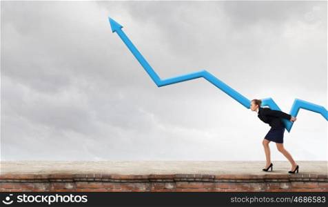 Businesswoman carrying big increasing graph. Growth concept. Growth and progress