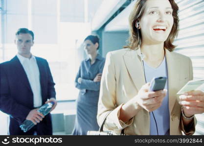 Businesswoman checking airline ticket