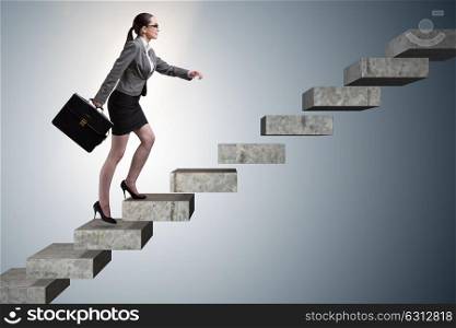 Businesswoman climbing career ladder in business concept