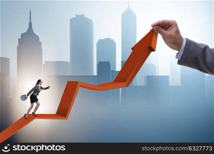 Businesswoman climbing line chart in economic recovery concept. The businesswoman climbing line chart in economic recovery concept