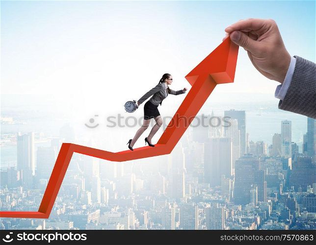 Businesswoman climbing line chart in economic recovery concept. The businesswoman climbing line chart in economic recovery conce