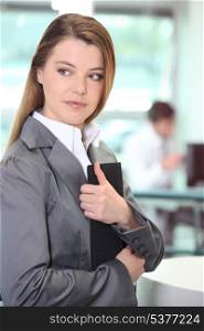 Businesswoman clutching important document