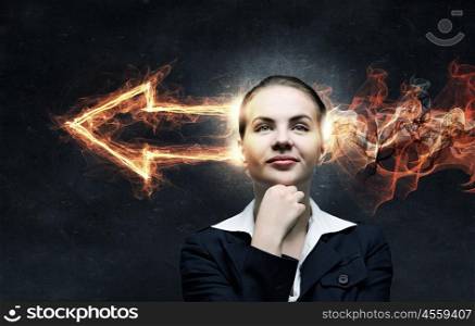 Businesswoman collecting her thoughts. Young pensive businesswoman and arrows coming out of her head