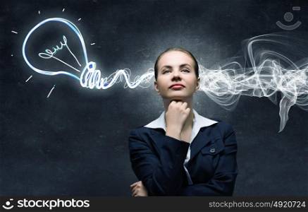 Businesswoman collecting her thoughts. Young pensive businesswoman and ideas coming out of her head