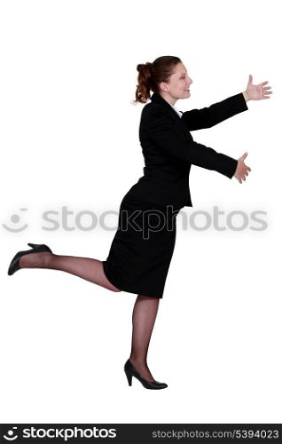 businesswoman dancing alone