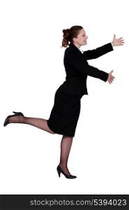 businesswoman dancing alone