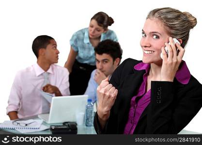 Businesswoman delighted with her phone call