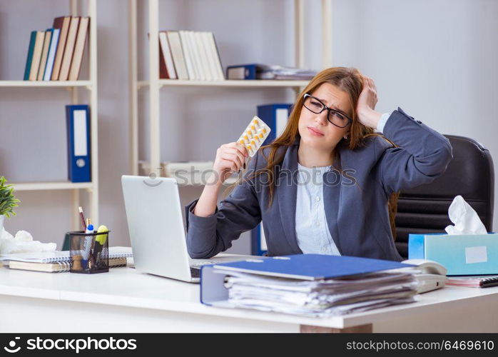 Businesswoman employee sick in the office